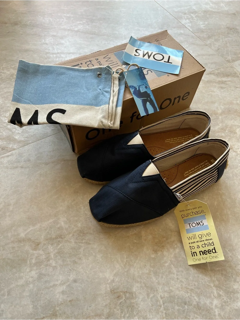 TOMS Navy Canvas Slip-On with Striped Heel
